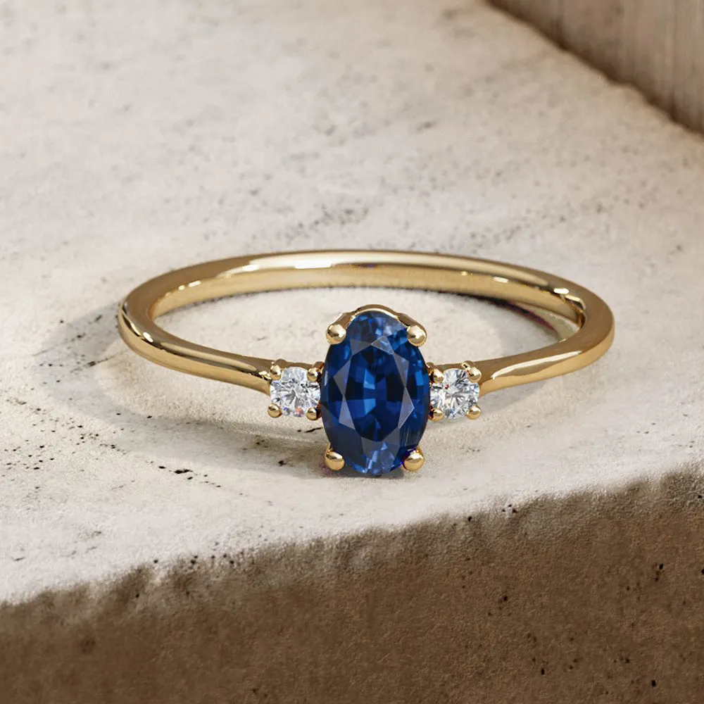 Oval Shape Sapphire and Diamond 3 Stone Ring - Image 2